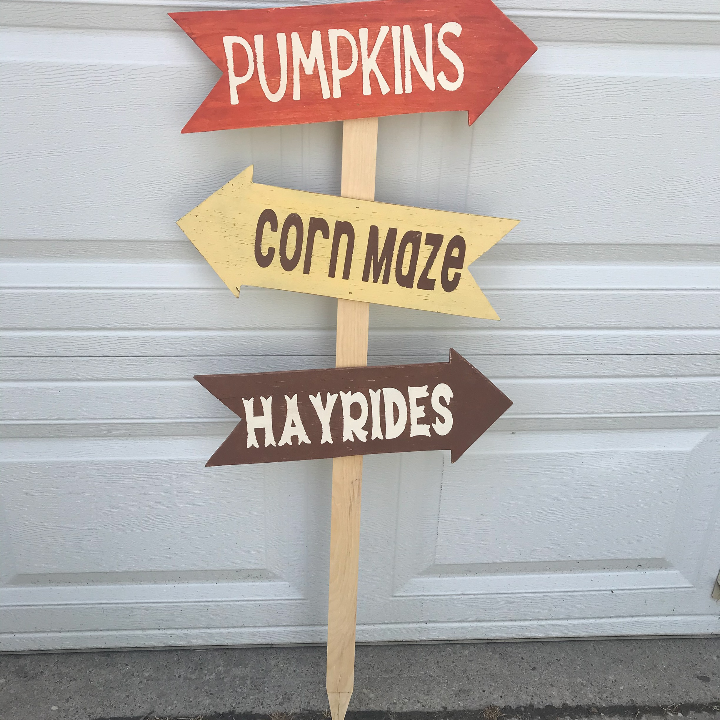 Arrows on yard stake for fall yard decor 