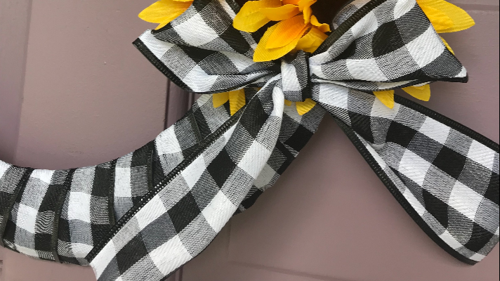 Simple bow on the dollar tree sunflower wreath door decor 