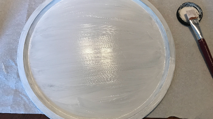 Using white chalk paint on the pizza pan door hanger 