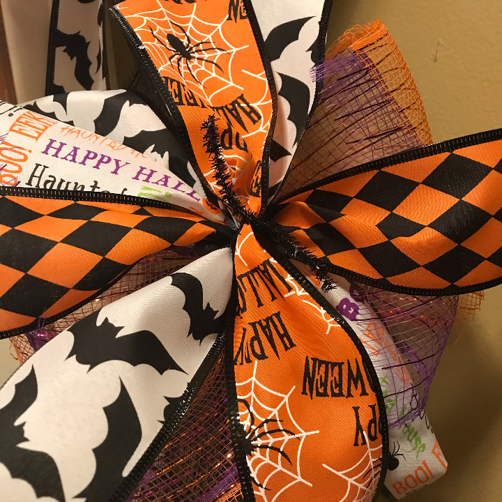 Dollar Tree Halloween Ribbon on the mesh galrland