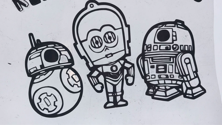 Star Wars droids in Cricut iron on vinyl to iron onto wood with the easypress mini