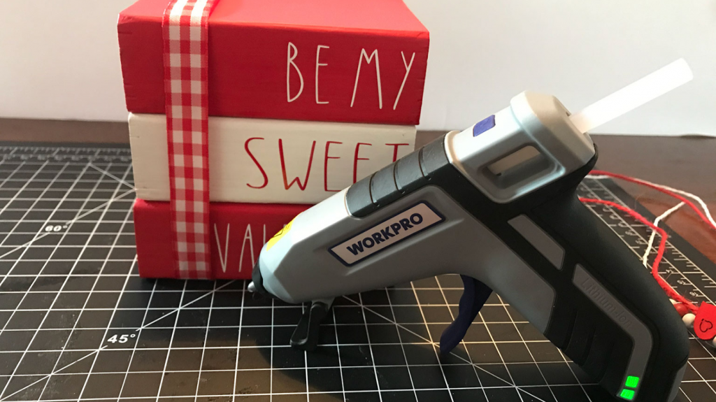 Adding decoration to the Rae Dunn Valentine 2x4 Books