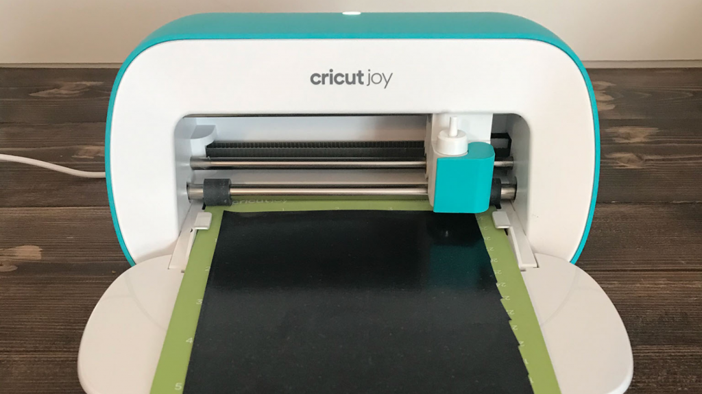 Cricut Joy cutting the smart iron on for the TNT bins