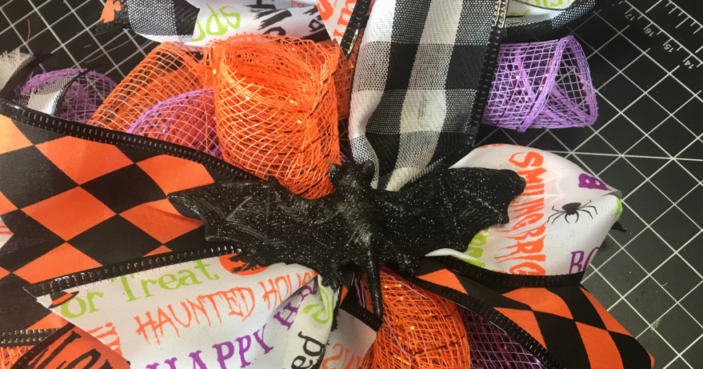 Halloween wreath tutorial from dollar tree with bats