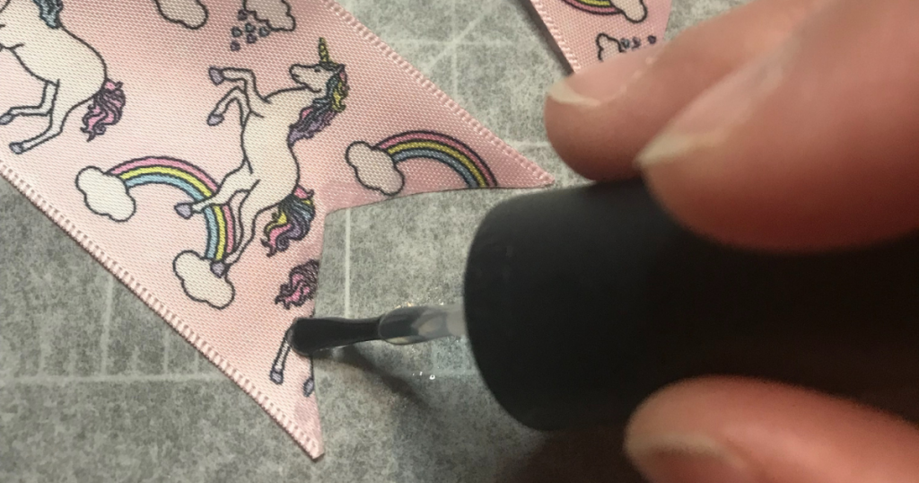 sealing ribbon with clear nail polish 