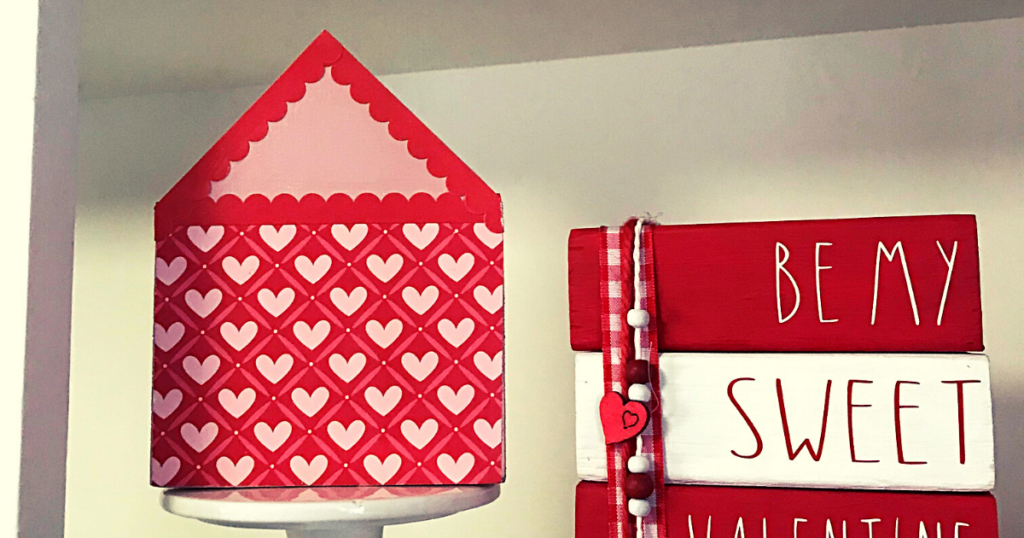 valentine wood house decorated with scrapbook paper