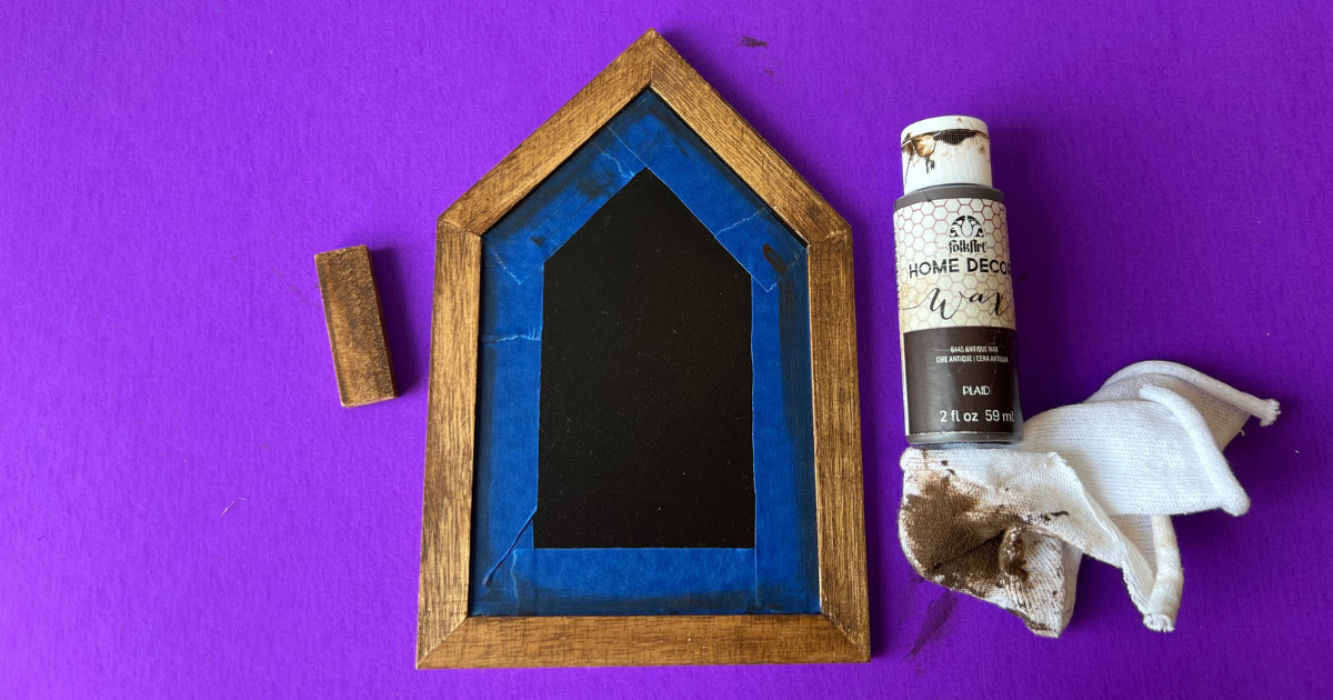 using antique wax to stain the sides of the DIY sunflower house decor 