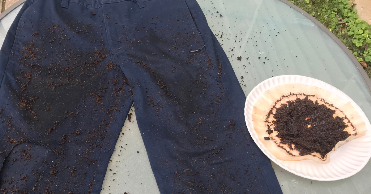 Making the kids zombie costume pants dirty 