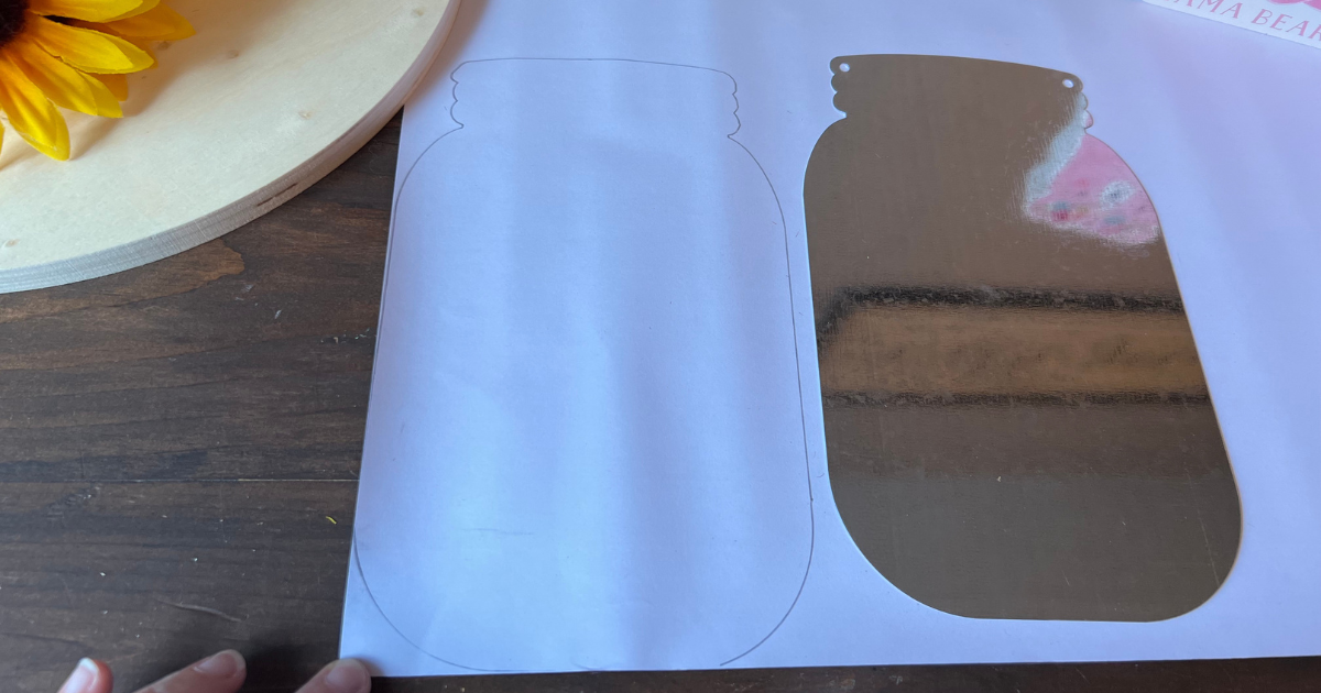 Trace and cut the black and white plaid vinyl to add to the mason jar